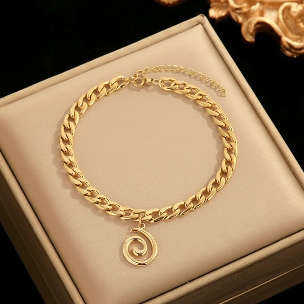 SPIRALÉ - 
Stainless Steel Spiral Pendant Ankle Chain For Women Minimalist Cuban Chain Design Suitable For Everyday Wear Ankle Jewellery