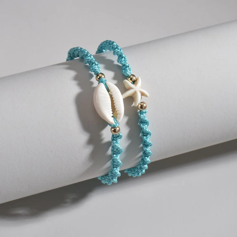 SHELLA - 
2-piece set of ocean style seashells, starfish, blue rope woven women's ankles